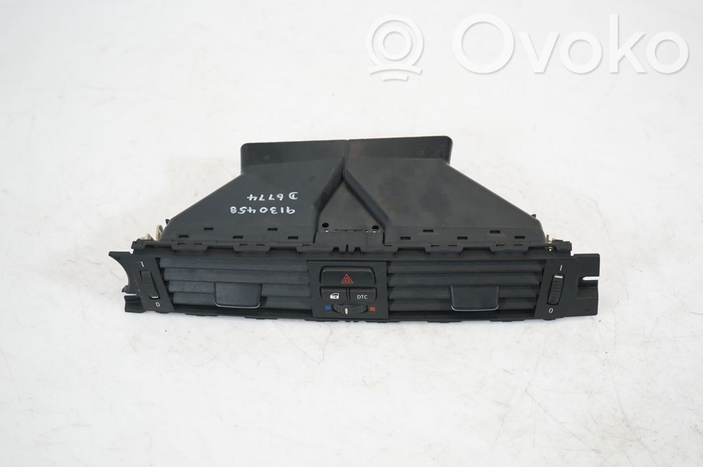 Dash center air vent grill