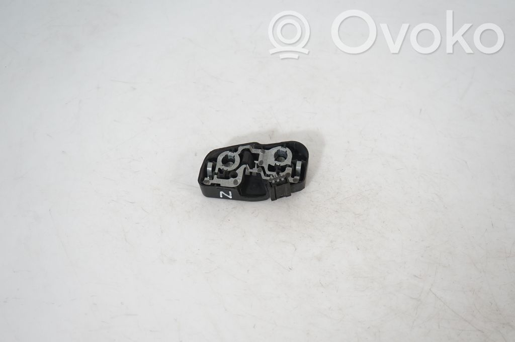 Tail light bulb cover holder