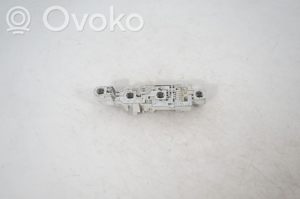 Tail light bulb cover holder