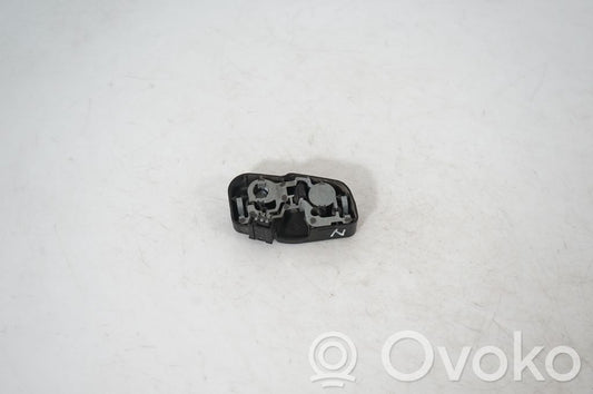 Tail light bulb cover holder