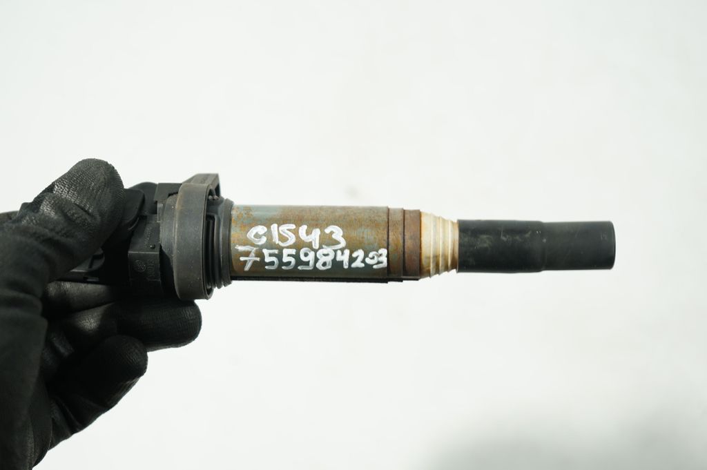 High voltage ignition coil (7)