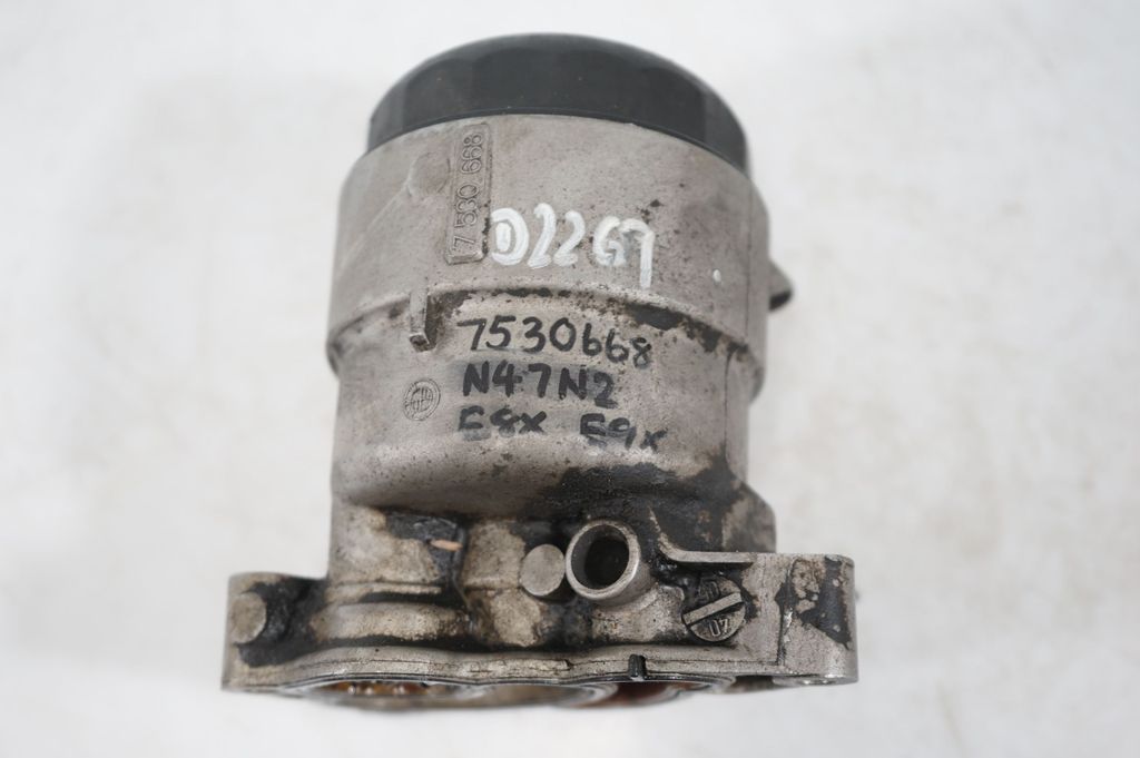 Oil filter mounting bracket (9)