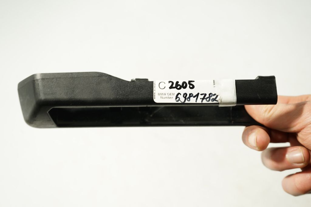 Front driver seat rail trim (8)