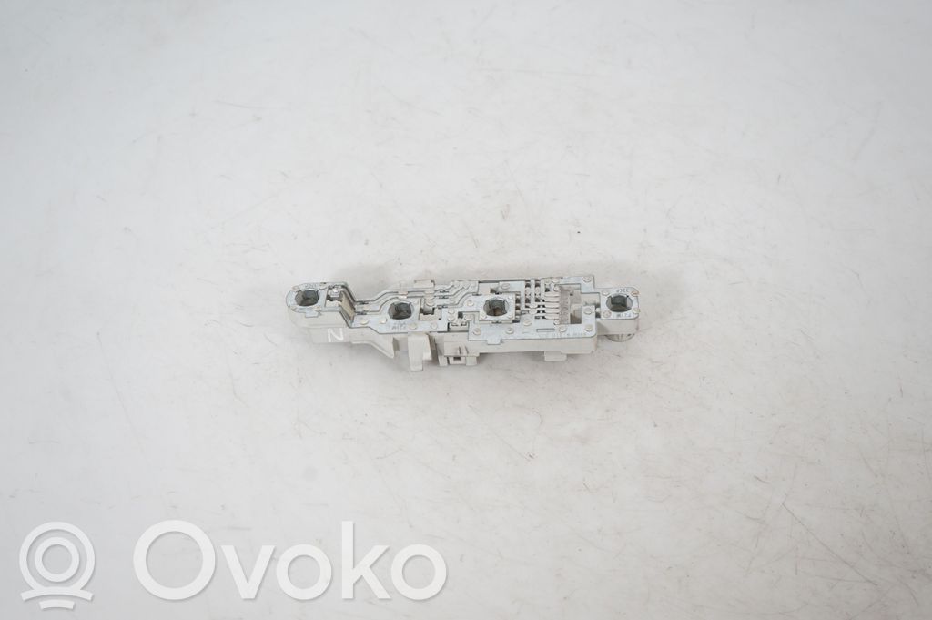 Tail light bulb cover holder