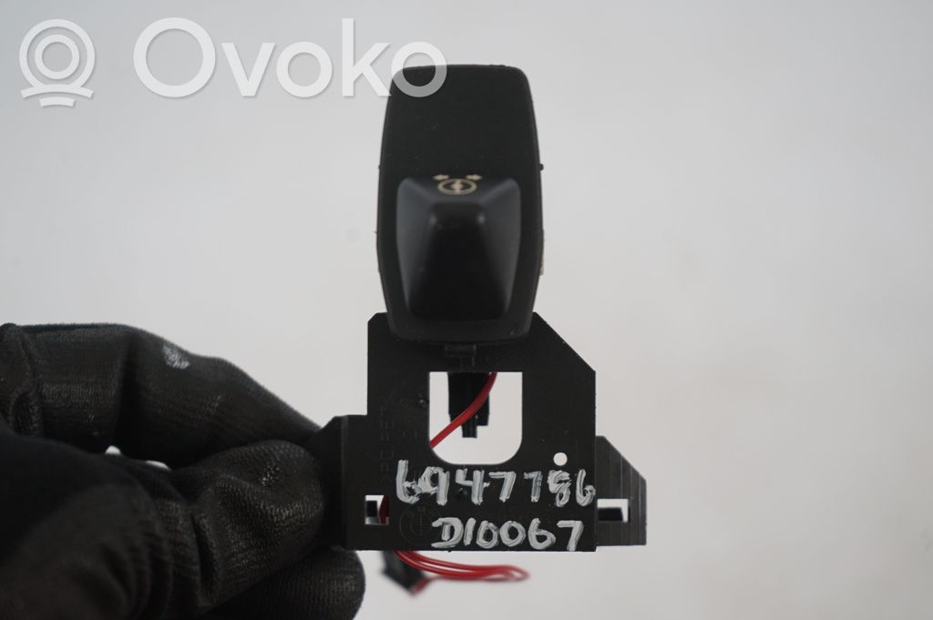 Steering wheel adjustment switch (9)