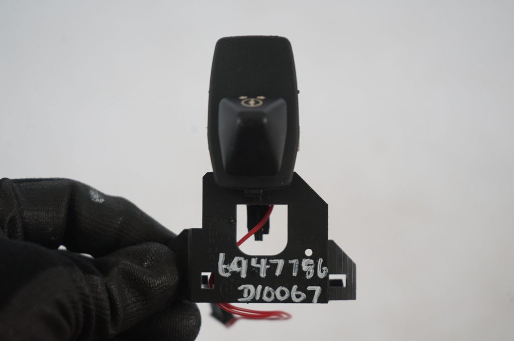 Steering wheel adjustment switch (9)