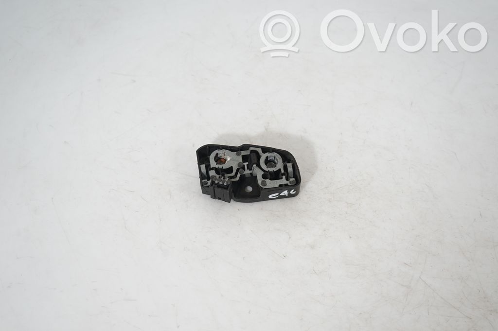 Tail light bulb cover holder