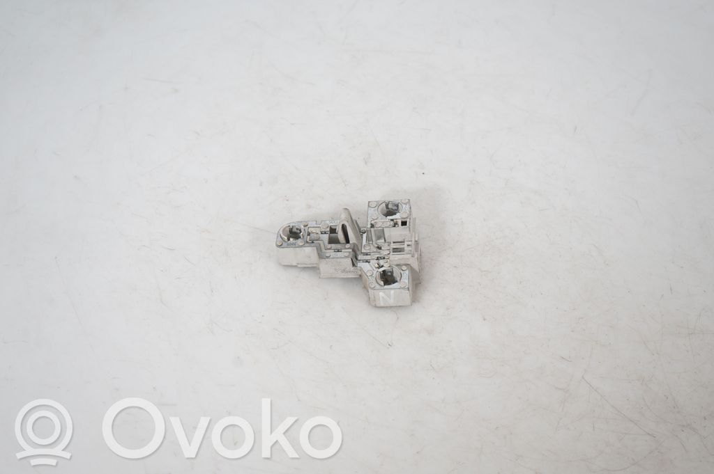 Tail light bulb cover holder