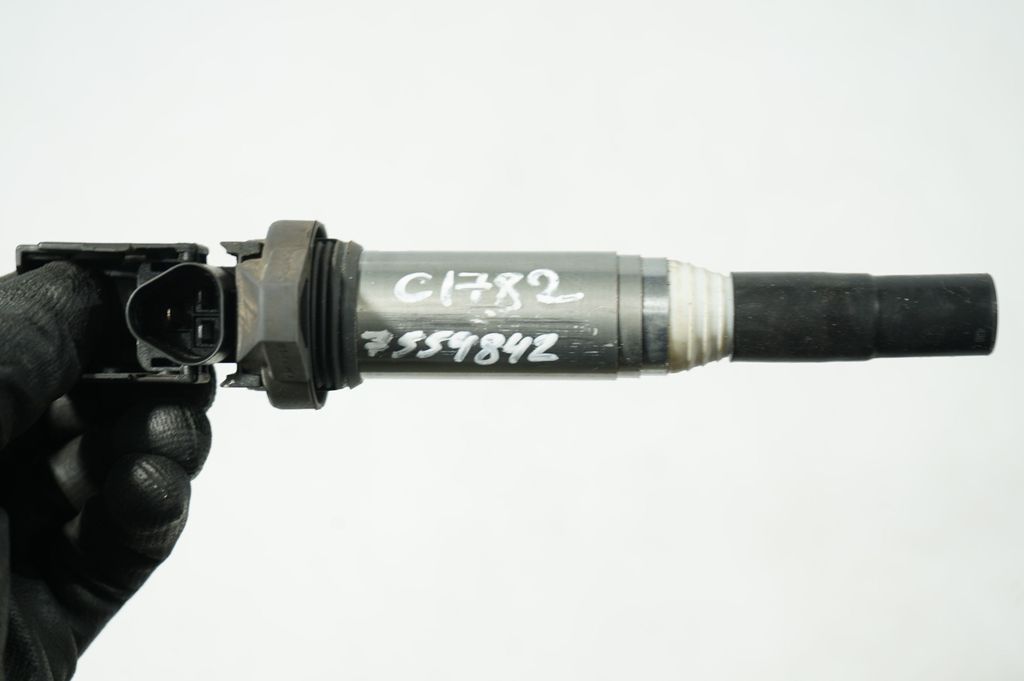 High voltage ignition coil (7)