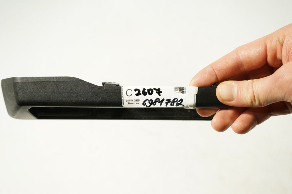 Front driver seat rail trim (8)