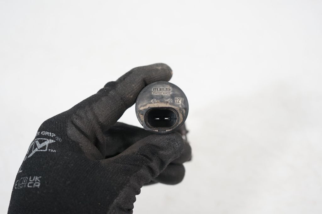 Headlight washer pump (8)