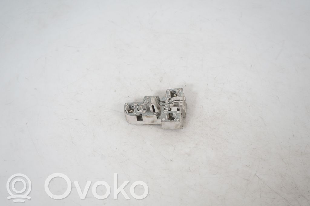 Tail light bulb cover holder