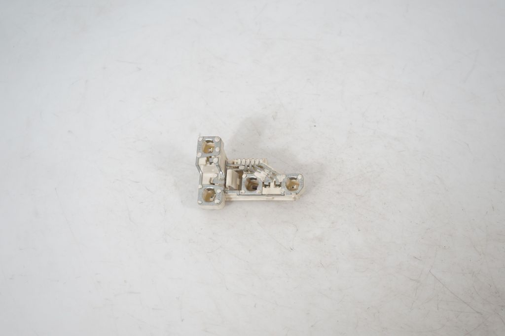 Tail light bulb cover holder