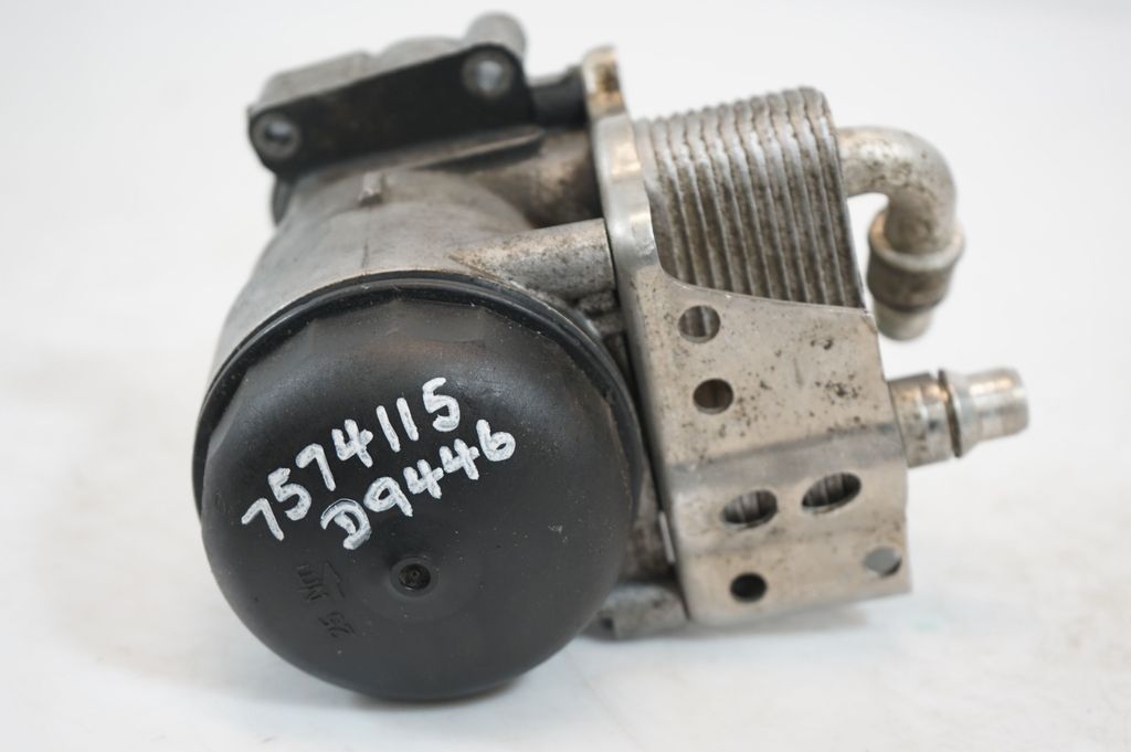 Oil filter mounting bracket (9)