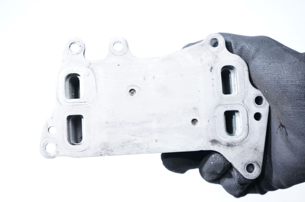 Oil filter mounting bracket (7)