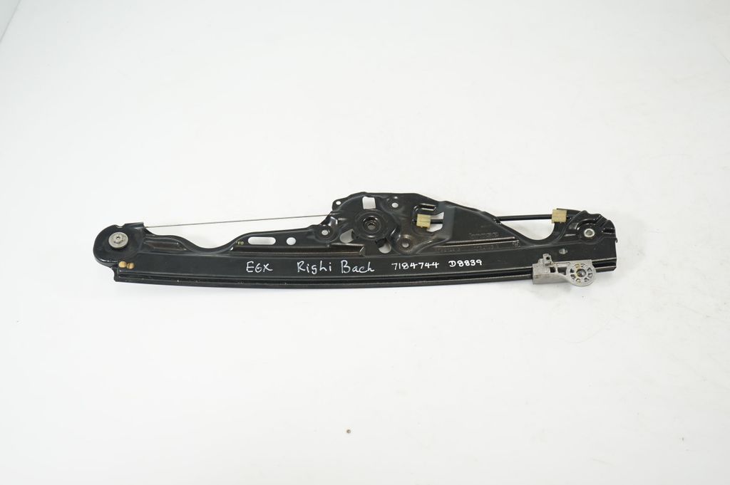 Rear door window regulator with motor