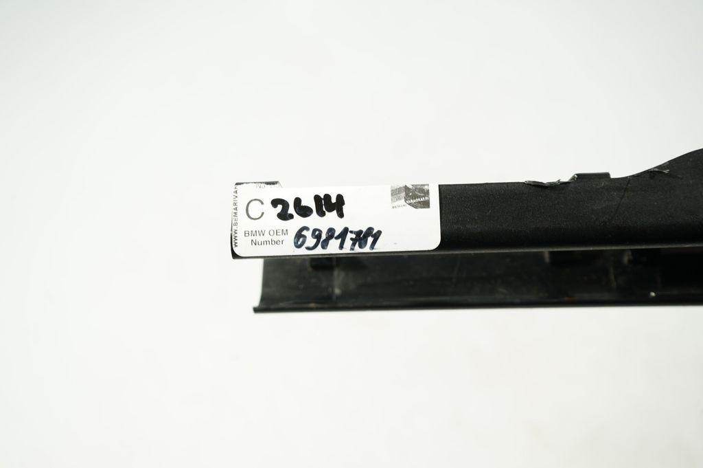 Front passenger seat rail trim (8)