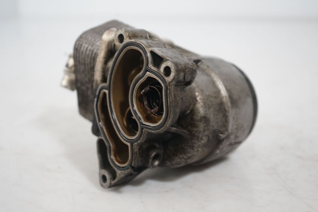 Oil filter mounting bracket (8)