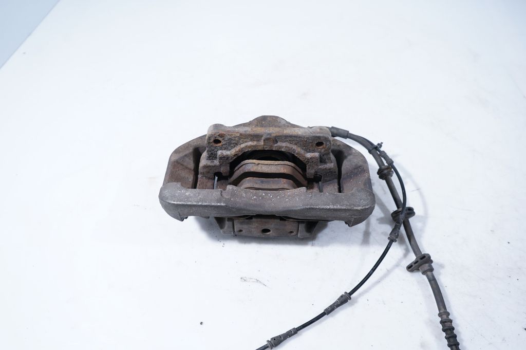 Front brake caliper (6)