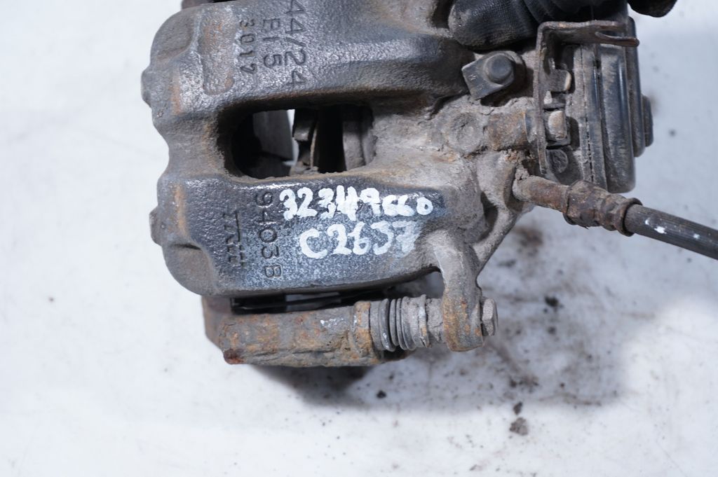 Rear brake caliper (7)