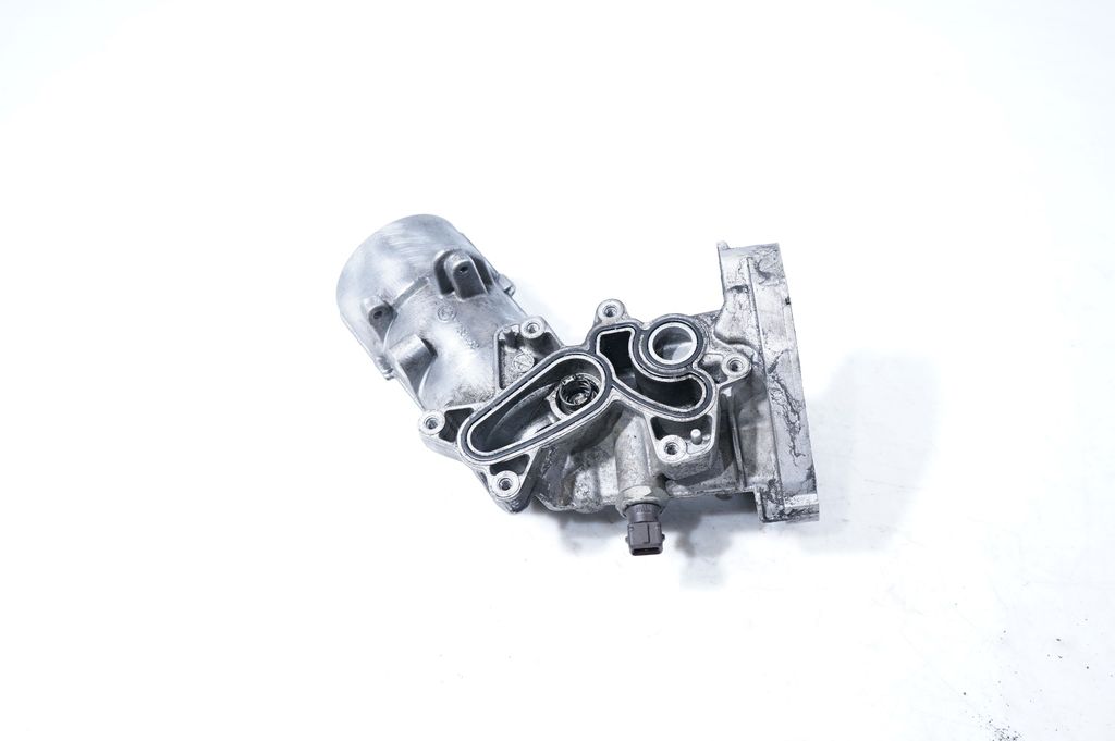 Oil filter mounting bracket (11)