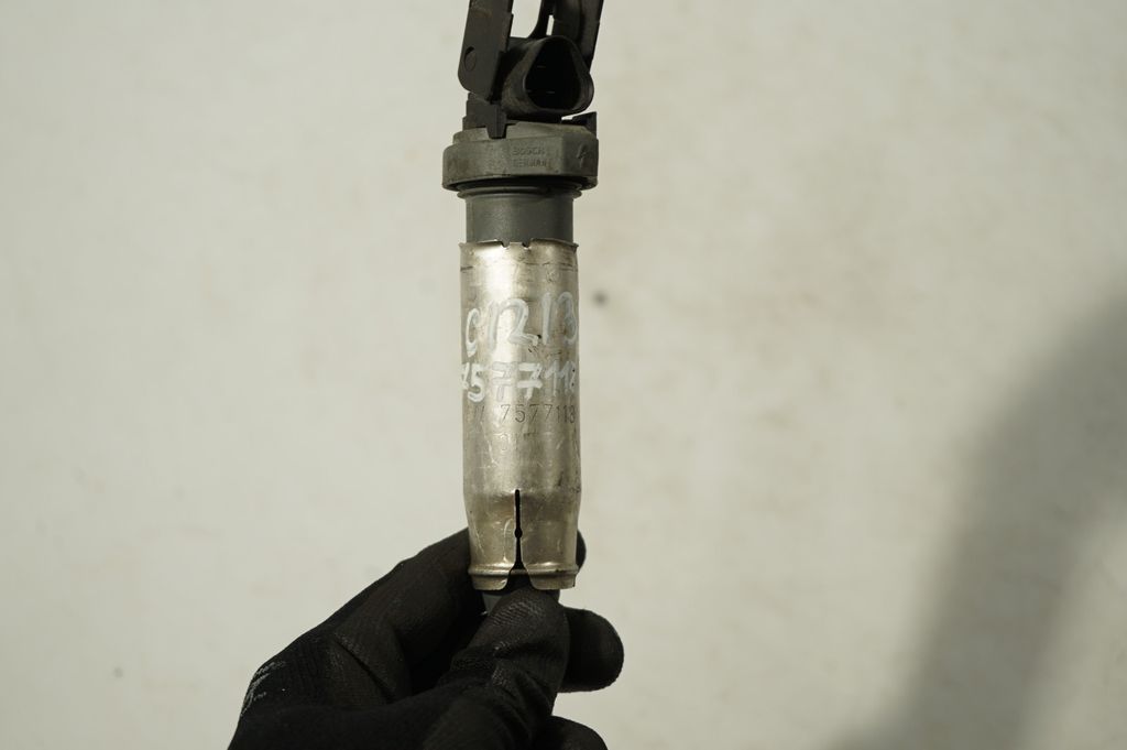 High voltage ignition coil (7)