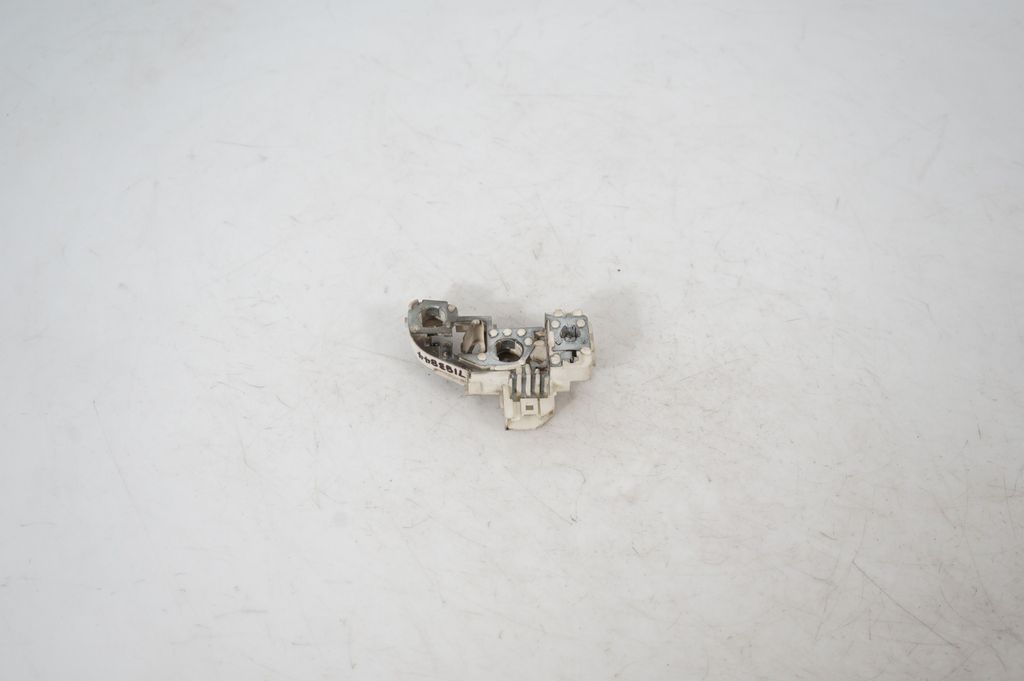 Tail light bulb cover holder