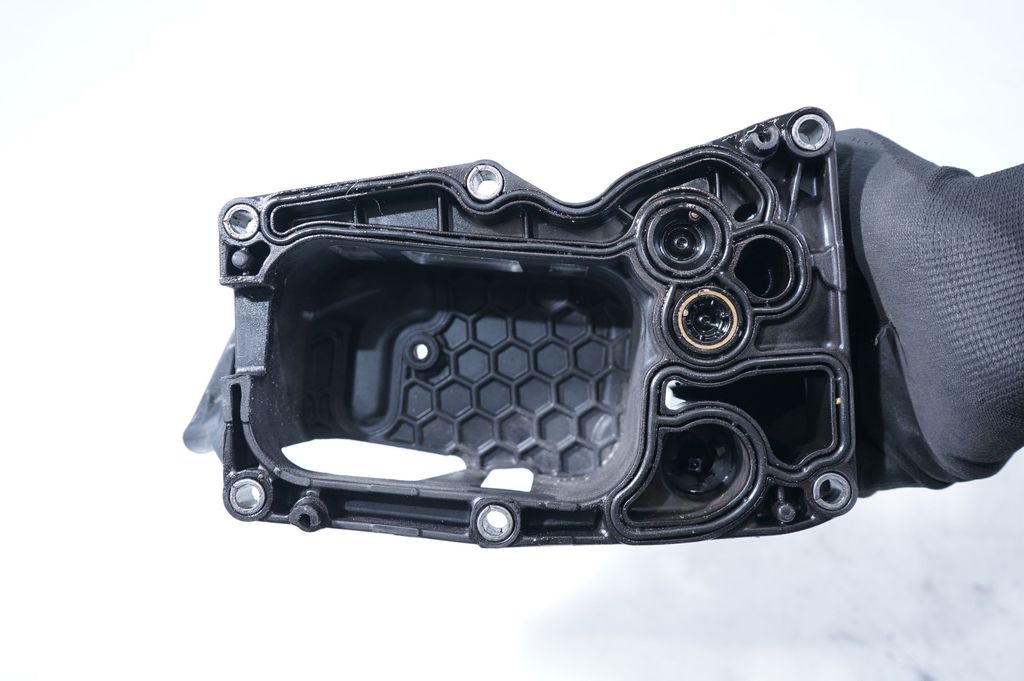 Oil filter mounting bracket (7)