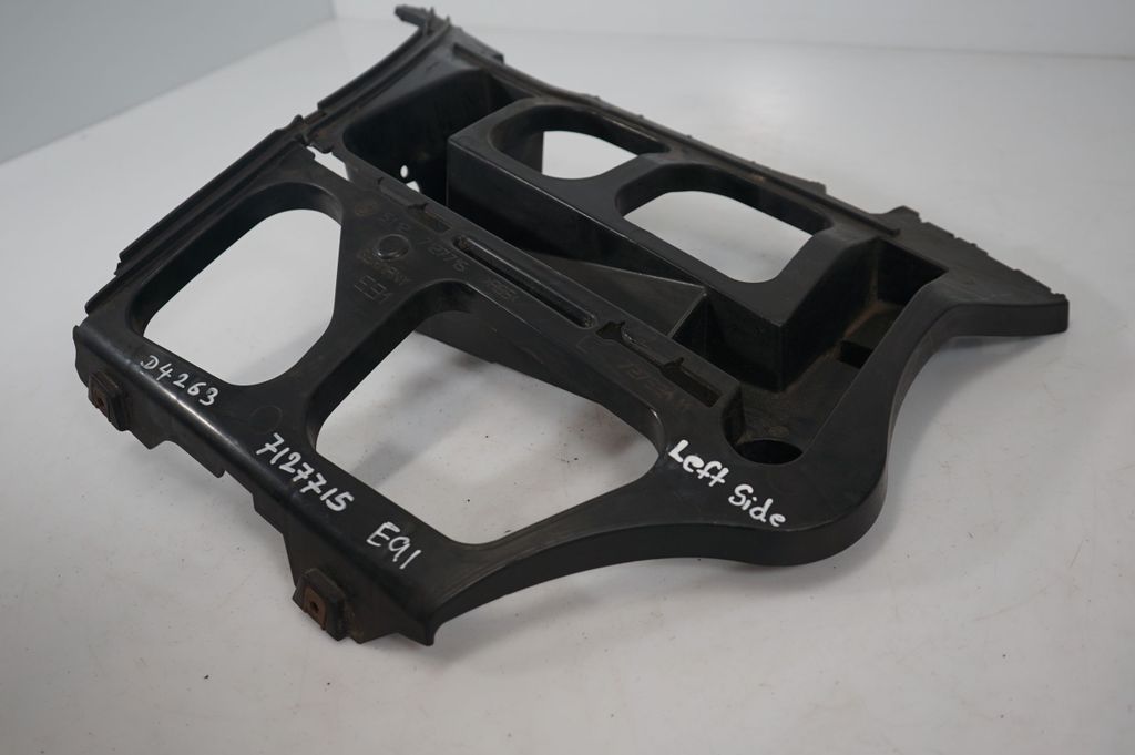 Rear bumper mounting bracket (7)