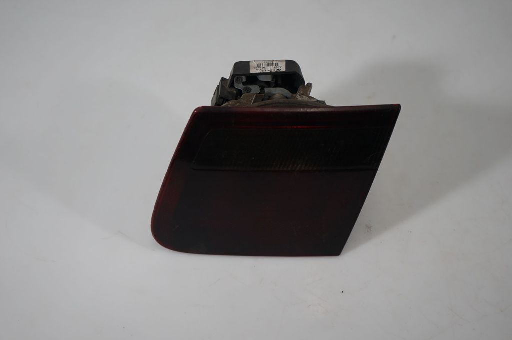 Tail light bulb cover holder