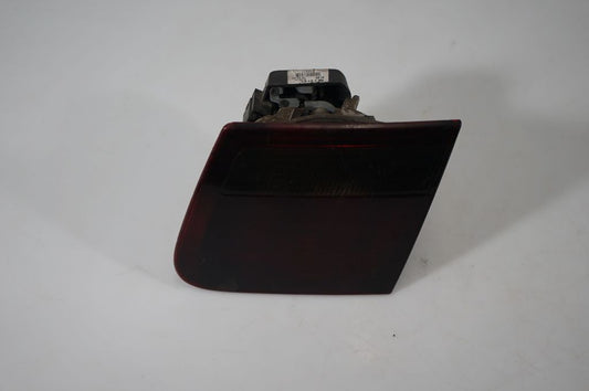 Tail light bulb cover holder