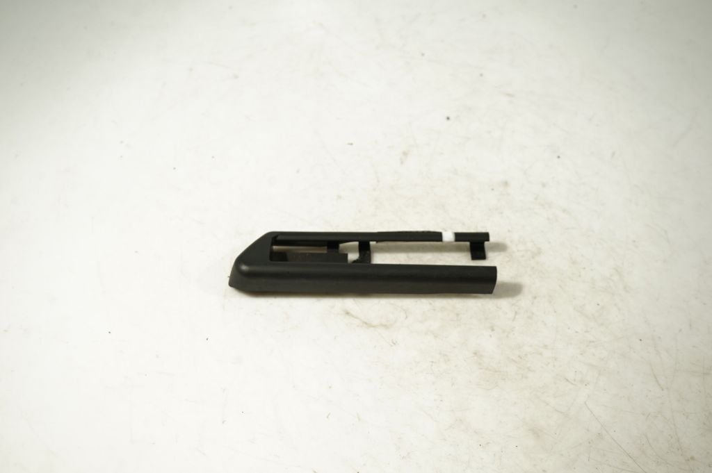 Front driver seat rail trim