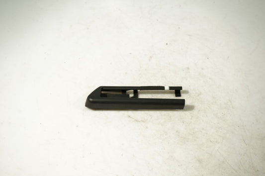 Front driver seat rail trim
