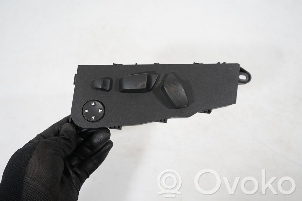 Seat control switch (9)