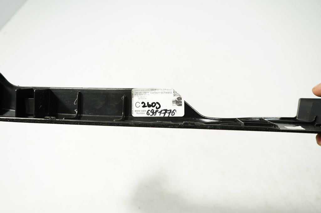 Front driver seat rail trim (7)