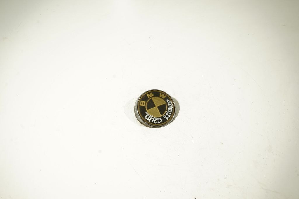 Manufacturers badge/model letters