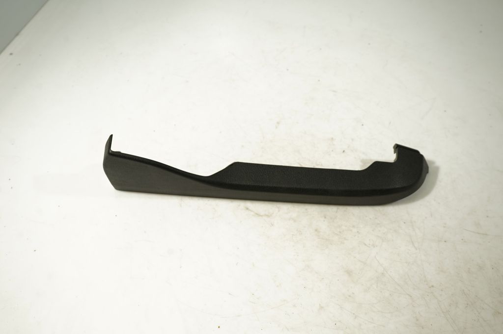 Front driver seat rail trim (5)