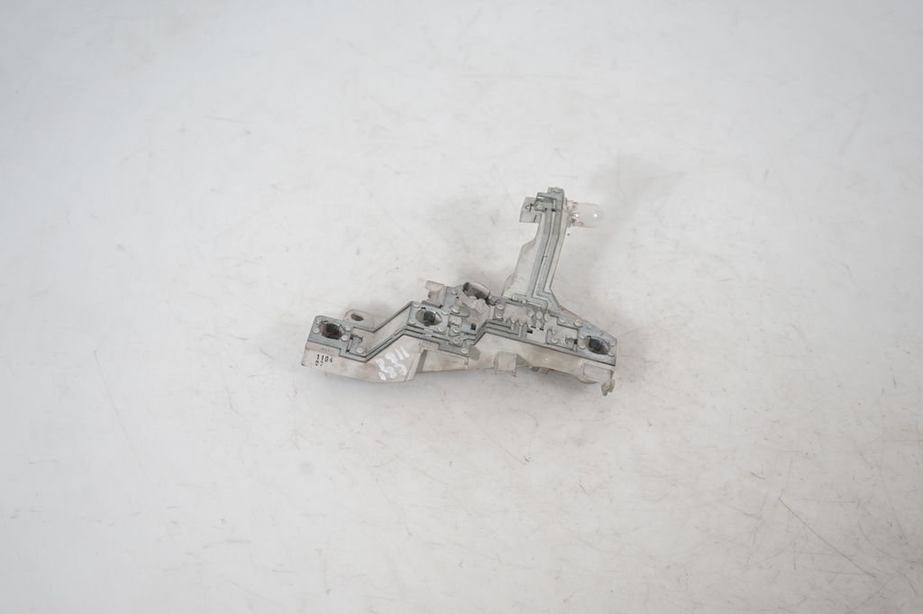 Tail light bulb cover holder