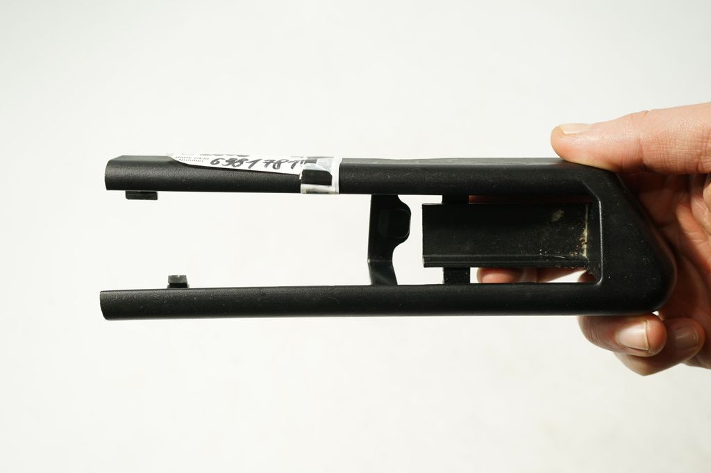 Front passenger seat rail trim (7)