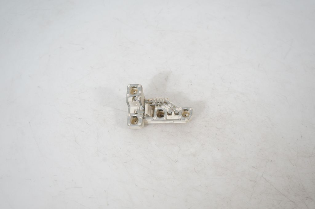 Tail light bulb cover holder