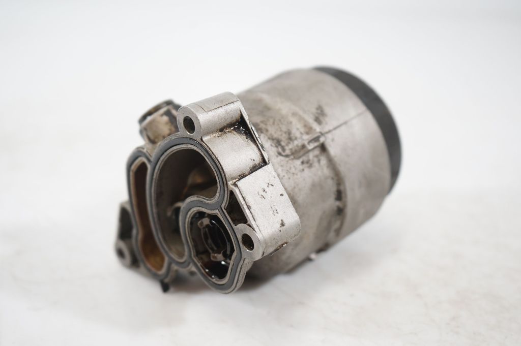 Oil filter mounting bracket (7)