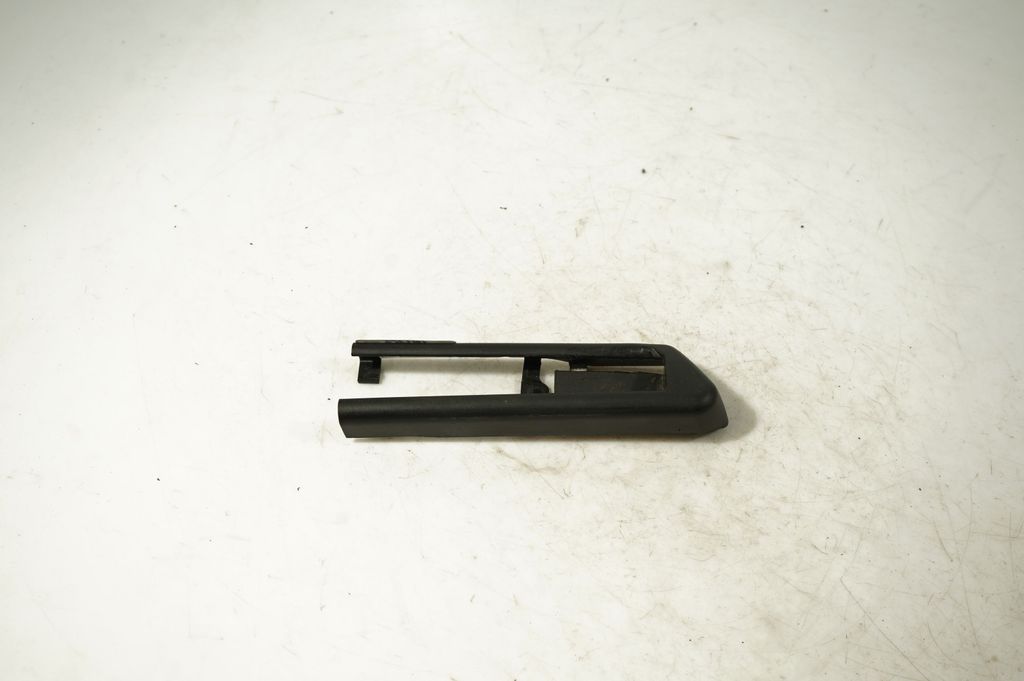 Front passenger seat rail trim