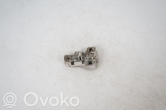 Tail light bulb cover holder