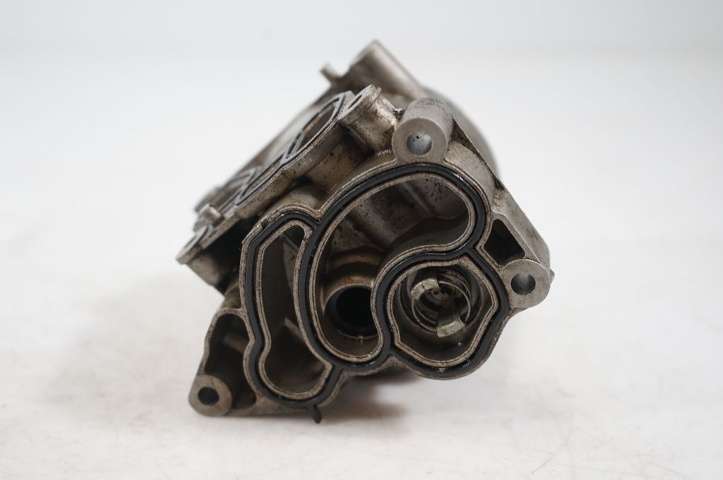 Oil filter mounting bracket (7)