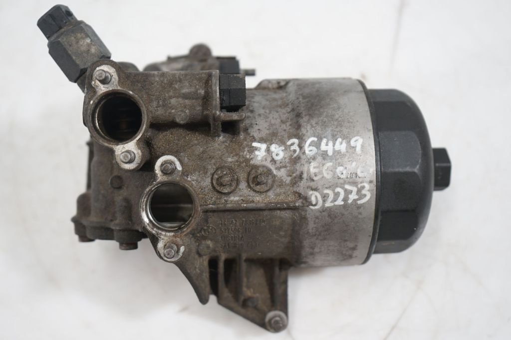 Oil filter mounting bracket (10)