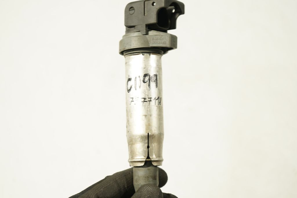 High voltage ignition coil (7)