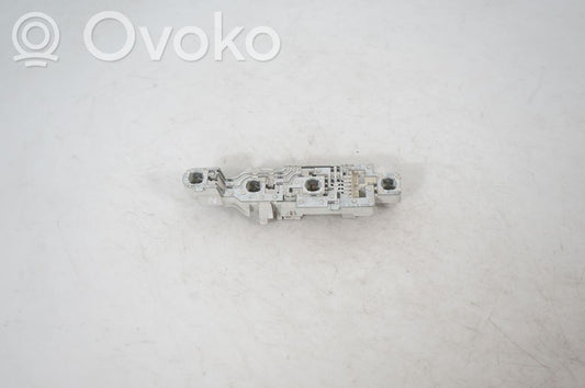 Tail light bulb cover holder