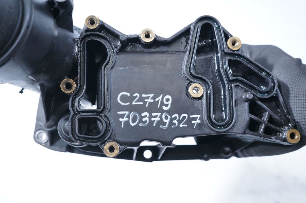 Oil filter mounting bracket (9)