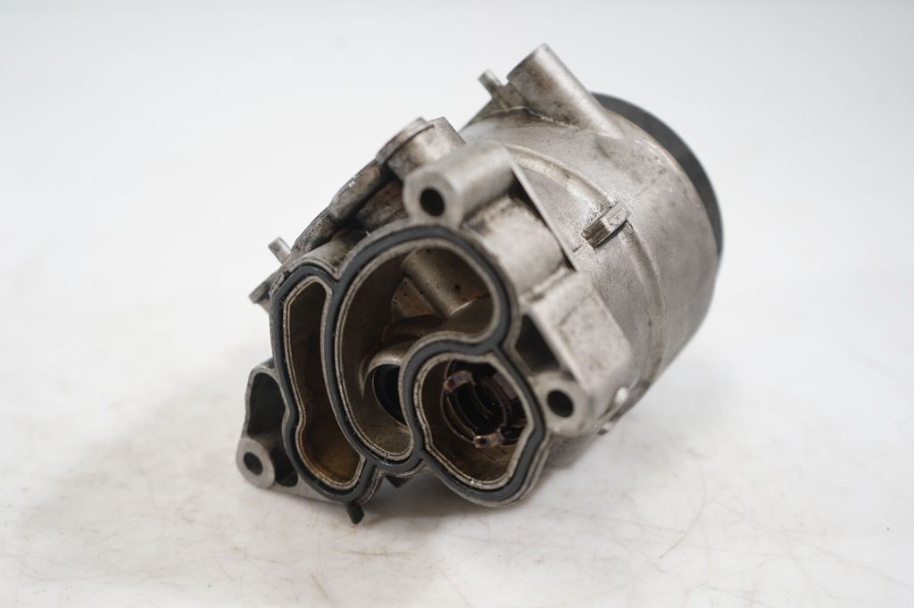 Oil filter mounting bracket (6)