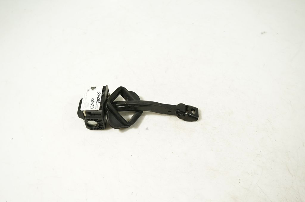 Front door check strap stopper (5)